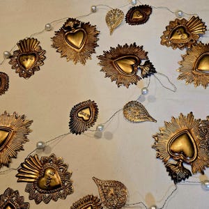 Sacred Flaming Hearts Garland gold antique finish metal ornaments with faux pearl white beads