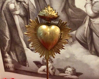 Flaming Heart Locket on Stand in a  Bright Gold Finish, display your vintage vignette