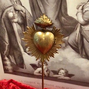 Flaming Heart Locket on Stand in a  Bright Gold Finish, display your vintage vignette