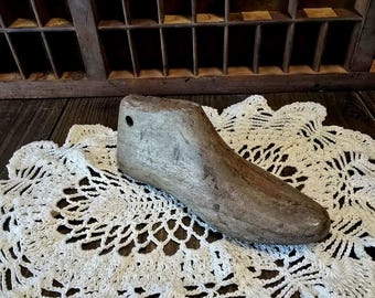 Primitive Small Childs Wooden Shoe Form Approximately 7x2.50x2.50 inches, natural wood, each is unique.