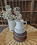 Chunky Butter Pat with Creamer Vignette, 3 white rolled edge pats approximately 3.25" inches and 1 white creamer 4oz. 3" inches tall.