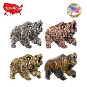 May include: Four metal bear figurines in different finishes: silver, copper, gold, and brown. Each bear is standing on all fours with its mouth open in a roaring pose.