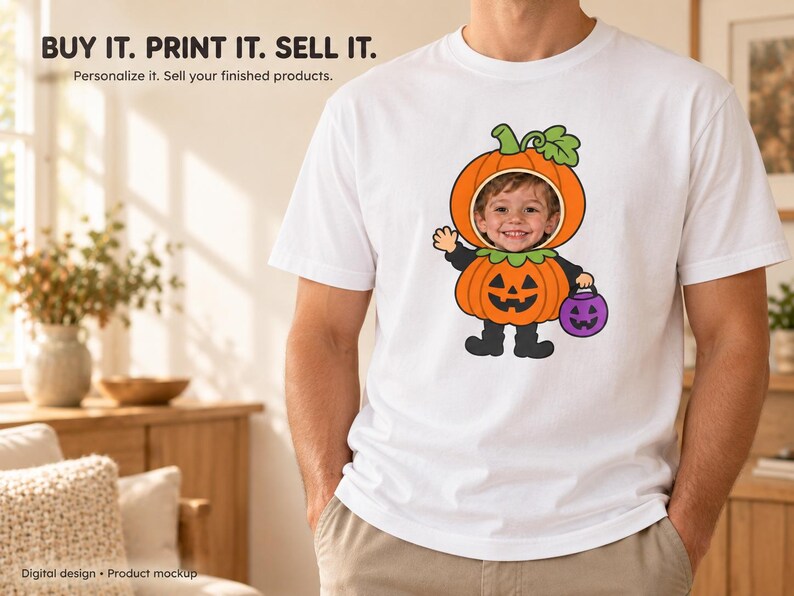 May include: A white short-sleeved t-shirt featuring a graphic of a cartoon pumpkin character with a child's face inserted into the pumpkin head. The character wears a black outfit, holds a purple jack-o'-lantern bucket, and waves a hand.