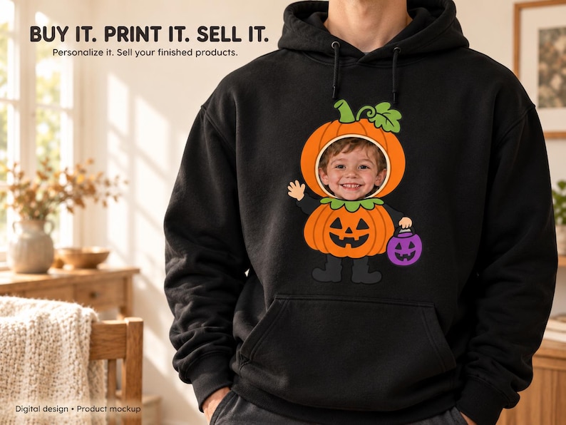 May include: A black hooded sweatshirt featuring a graphic of a child's face inside a pumpkin costume. The design includes a green stem, orange pumpkin body, black boots, and a purple jack-o'-lantern bucket. Text reads: BUY IT. PRINT IT. SELL IT.