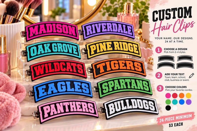 May include: A collection of ten curved hair clips featuring bold, block-letter text in various colors including pink, purple, teal, yellow, red, orange, blue, green, and white. Each clip displays a unique name such as Madison, Riverdale, and Tigers.