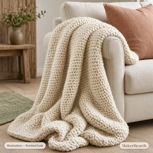 May include: A chunky knit throw blanket in a cream color draped over a light-colored sofa. The blanket features a thick, textured yarn weave. Two labels are visible at the bottom, one reading "Illustration - finished look" and the other "MakerHearth".