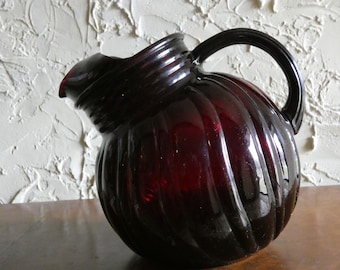 1950s Mid Century Anchor Hocking Ruby Red Glass Swirl Pattern Tilted Ball Shaped Pitcher
