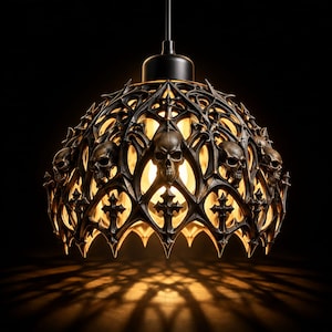 May include: A dome-shaped pendant light fitting featuring a dark, intricate metal frame with sculpted human skulls and cross motifs. The openwork design allows warm, glowing light to shine through, casting detailed shadows below.