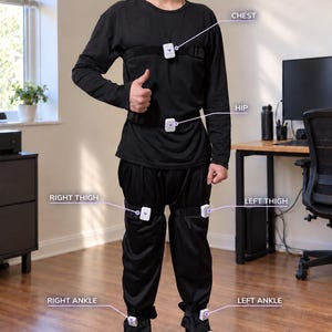 May include: A virtual reality headset and a motion tracking system consisting of six small white sensors attached to black straps worn on the chest, hip, thighs, and ankles. The sensors are labeled with text indicating their placement.
