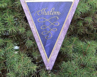 Shalom, a hand-crafted ornament with archival materials; made of approximately 70% recycled material