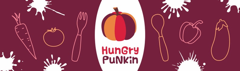 May include: A red and orange pumpkin with a white outline, a fork, a spoon, a carrot, a tomato, a bell pepper, and an eggplant. The text "Hungry Punkin" is written in white letters on a white background.
