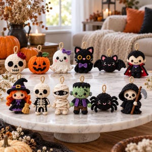 May include: A collection of twelve small, crocheted Halloween ornaments featuring a skull, jack-o'-lantern, ghost, black cat, bat, vampire, witch, skeleton, mummy, Frankenstein's monster, spider, and grim reaper, each with a small hanging loop.