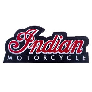 May include: An embroidered patch featuring the text Indian in a red script font with a white outline, positioned above the word MOTORCYCLE in a white sans-serif font, all set against a black background with a die-cut border shape.