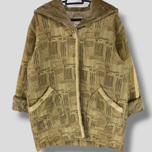 Vintage Enrico coveri sport geometric pattern with faux leather trim hoodie coat designer southwestern outerwear jacket size Medium
