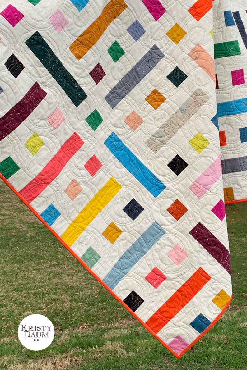 modern quilt made up of colorful squares and rectangles titled floorplan