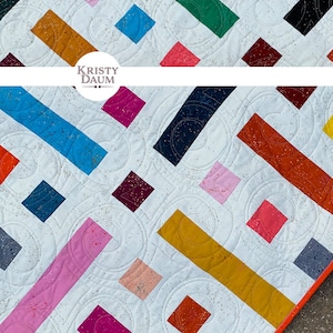 modern quilt made up of colorful squares and rectangles titled floorplan