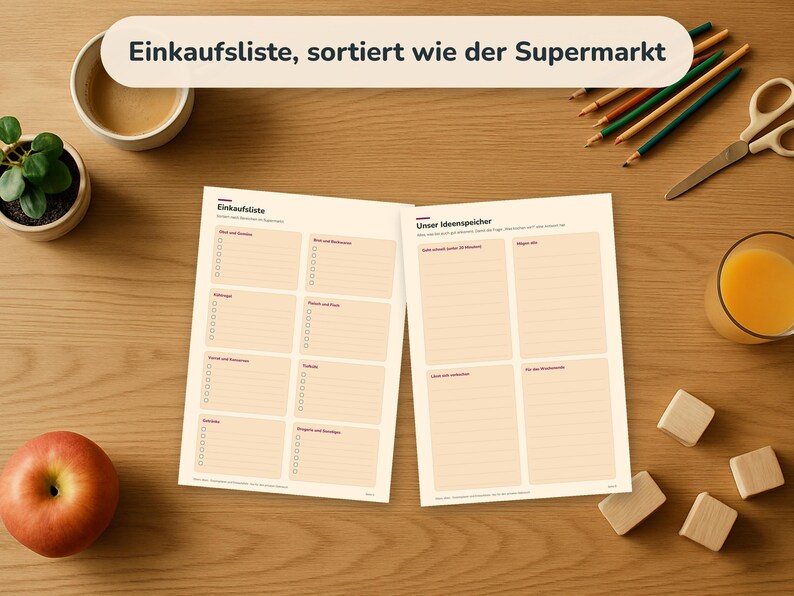 May include: Two white paper sheets with printed grids and text, including the titles Einkaufsliste and Unser Ideenspeicher. The sheets feature organised sections with checkboxes and lines for writing lists, presented on a wooden surface.