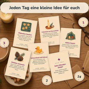 May include: A set of rectangular activity cards with cream-colored backgrounds and German text, featuring illustrations of holiday-themed tasks like baking cookies, building a fort, and collecting pinecones, arranged with craft supplies and a mug.