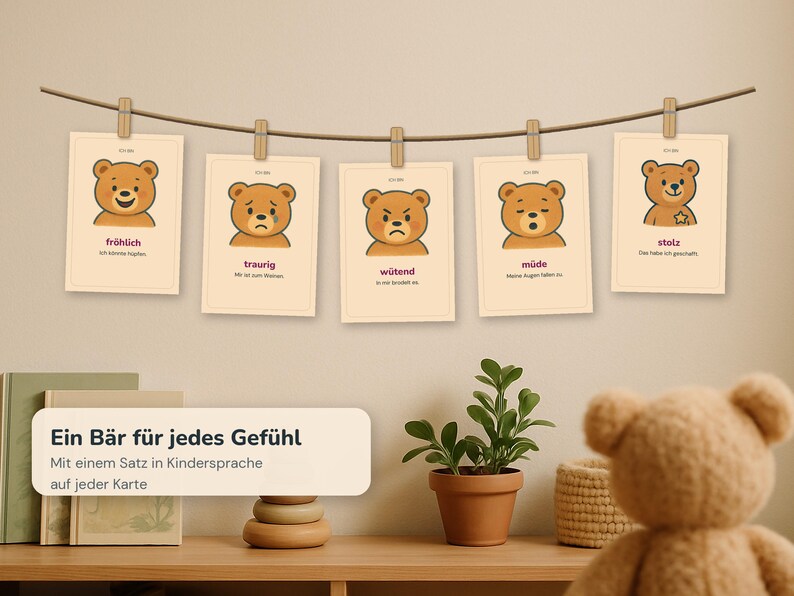 May include: Five rectangular cards hanging on a string with wooden clips, each featuring a brown bear illustration depicting different emotions: happy, sad, angry, tired, and proud, with German text labels and sentences printed below each bear.