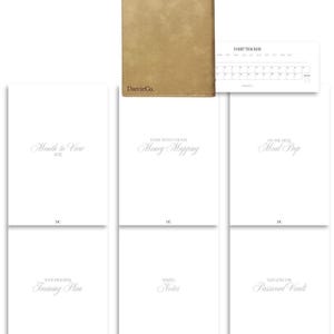 May include: A tan leather-bound planner with the DarcieCo. logo, accompanied by six white insert pages labeled Month to View 2027, Money Mapping, Meal Prep, Training Plan, Making Notes, Password Vault, and a Habit Tracker card.