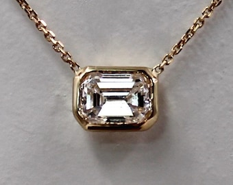 Emerald cut diamond necklace designs clearance
