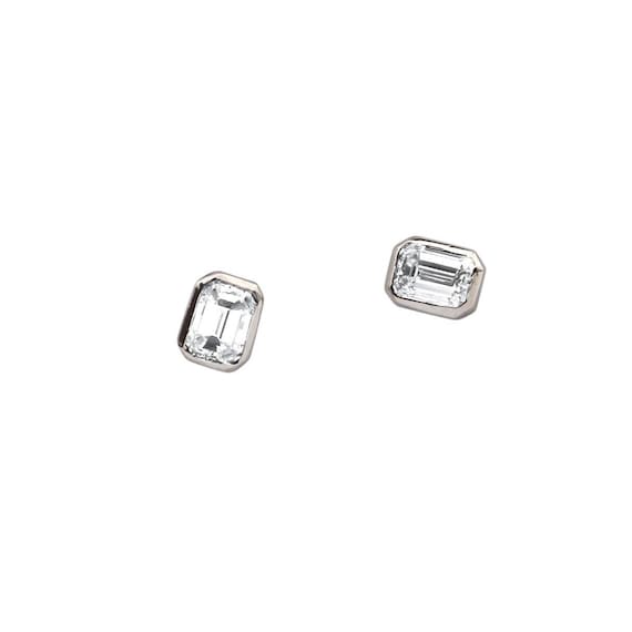 Emerald cut .60 carat diamond stud earrings