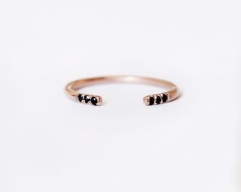 Delicate black solitaire diamond stack / cuff ring