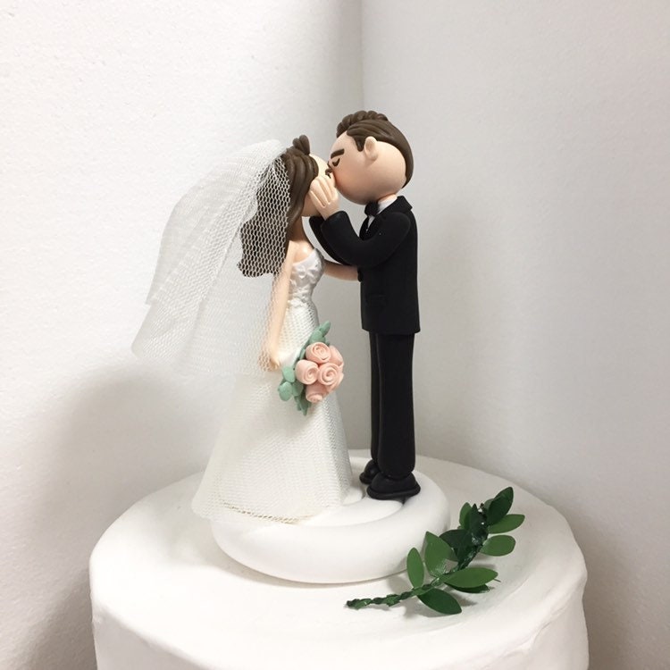 thumbnail interactive-video image 1 of World Cake Topper. Kissing Bride & Groom Wedding Cake Topper With Dog 1 of 12