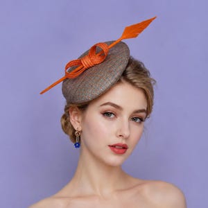 Silver Pillbox Fascinator hat with Orange bow,veiling&feather, Derby Hat