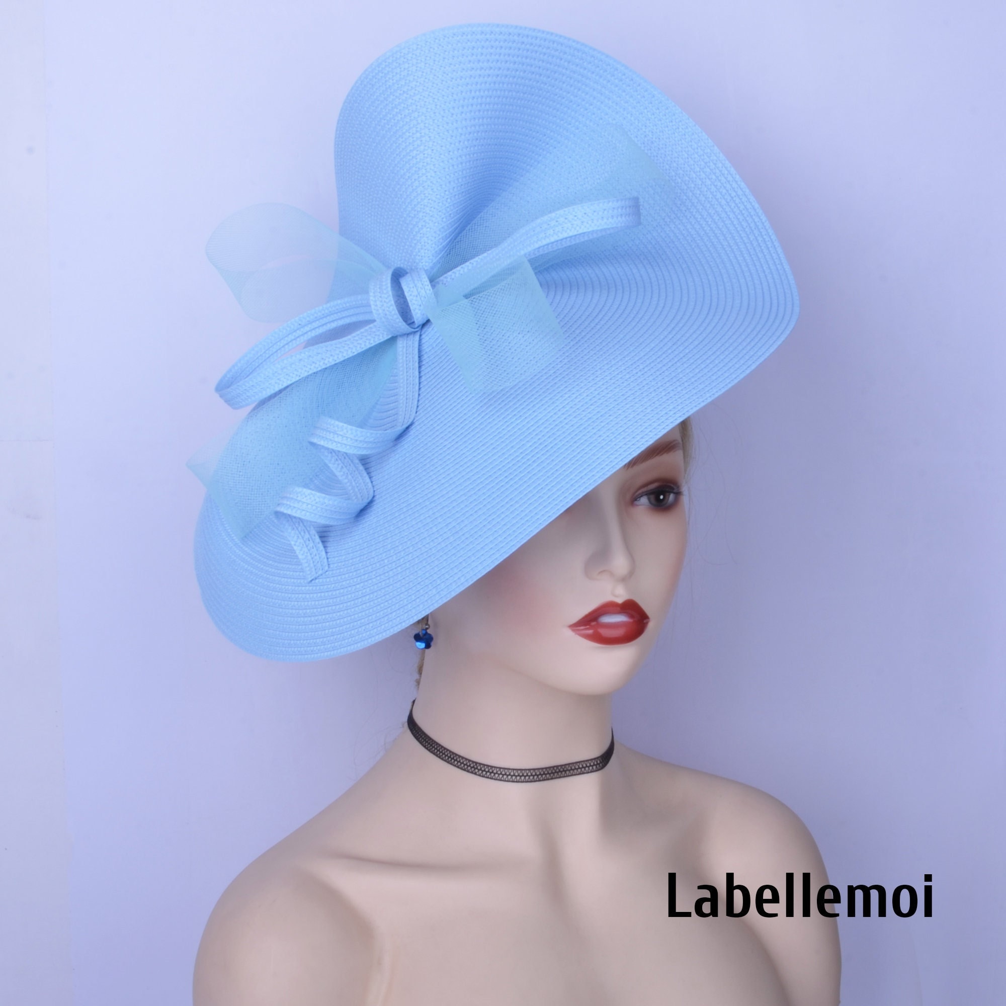 Pale blue hats and top fascinators