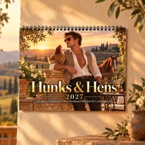 May include: A 2027 wall calendar titled Hunks & Hens featuring a photograph of a person wearing a white shirt and tan vest, holding a brown chicken. The text reads Hunks & Hens 2027 12 Months of Handsome Men, Feathered Mischief & Country Charm.