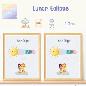 May include: Two framed prints with a light blue background. Each print features a smiling yellow sun, Earth, and a pink moon, illustrating a lunar eclipse. The text "Lunar Eclipse" is above the illustration. Below the illustration are two children. The prints are in wooden frames.