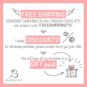 May include: A pink and white graphic with text that reads "FREE SHIPPING" and "DISCOUNTS". The image also includes a drawing of a gift box and the text "GIFT pack". The brand name "BARMINE" is also visible.