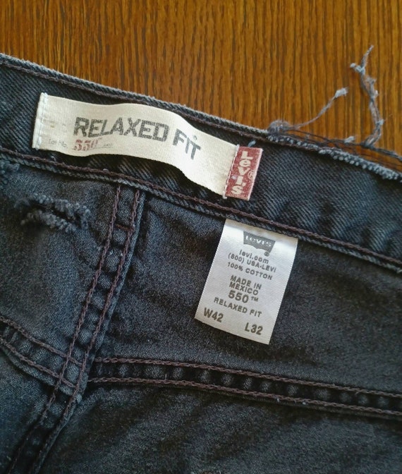 Vintage black Levis 550 red tag distressed cut of… - image 5