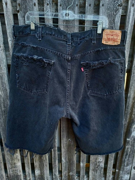 Vintage black Levis 550 red tag distressed cut of… - image 2