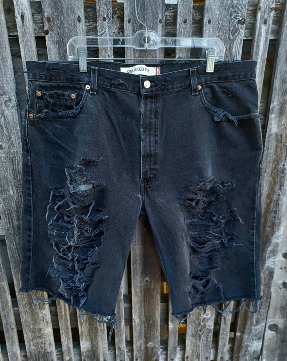 Vintage black Levis 550 red tag distressed cut of… - image 1