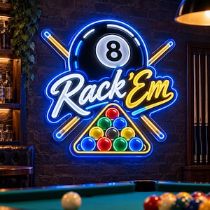 May include: A neon sign featuring a black 8-ball, two crossed pool cues, and a triangular rack of colorful billiard balls. The text Rack 'Em is displayed in bright white and yellow neon script. The sign glows against a dark brick wall.