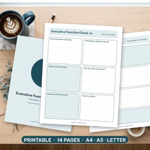 Minimalist executive function worksheets printed and resting on a bright wooden desk with a pen.