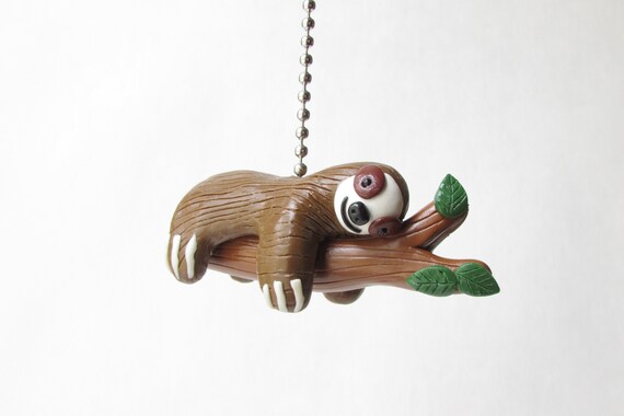 Sloth Just Hanging Around Ceiling Fan And Light Pull Chain