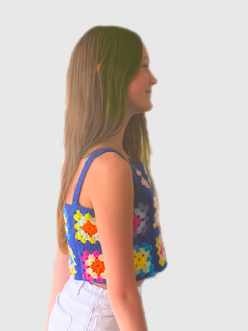 May include: A blue crochet top with colorful granny squares. The top is sleeveless and has a cropped length.
