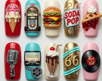 May include: A set of ten 3D nail art press-on tips featuring retro diner themes. Designs include an ice cream cone, jukebox, burger, soda pop, cherry pie, microphone, Starlite drive-in sign, chocolate milkshake, Route 66 sign, and a vinyl record.