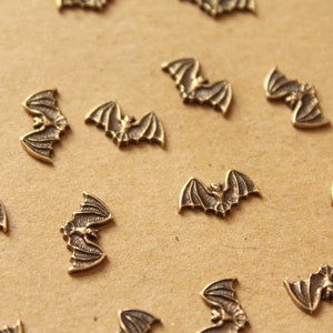 5 pc. Tiny Antique Brass Bat Stampings: 7mm by 12mm - made in USA | AB-024