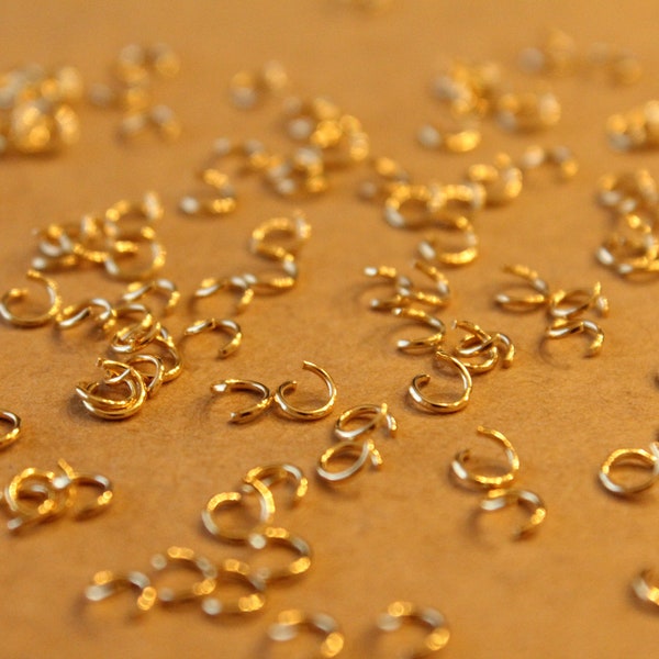 100 pc. 4mm Gold Plated Stainless Steel Jumprings, 22 gauge | FI-649
