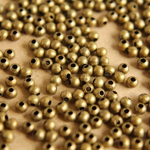 150 pièces. Perles intercalaires en bronze antique de 3 mm FI-017 image 3