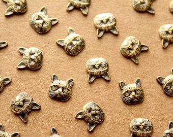 10 pc. Small Antique Brass Plated Cat Heads: 8mm by 8.5mm - made in USA | AB-122