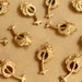 see more listings in the Med./Lg. Brass Stampings section