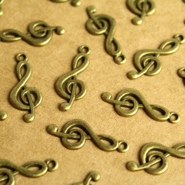 20 pc. Antique Bronze Treble Clef Charms: 26mm by 10mm | MIS-263