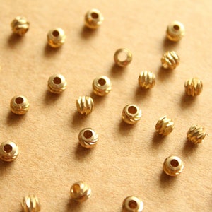 25 pc. 4mm Raw Brass Textured Cut Spacer Beads | FI-477