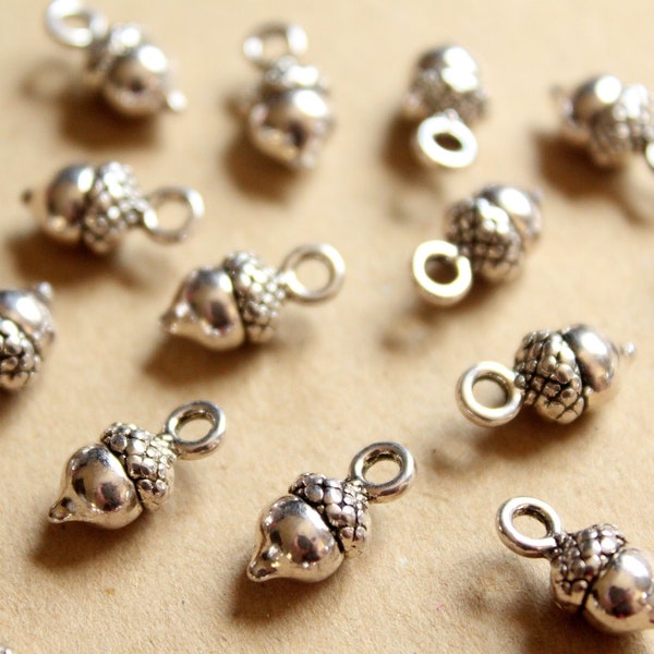 25 pc. Small Tibetan Style Antique Silver Plated Acorn Charms: 14mm by 7mm - | MIS-186