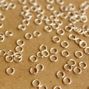 200 pc. 4mm Bright Silver Open Jumprings, 22 gauge FI-233 image 1